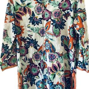 Kikisol Medium Floral Tunic Top with orange trim detail.